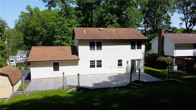 452 Cherokee Dr, Center Twp But, PA 16001 - back of property with a deck, central air condition unit, and roof with shingles
