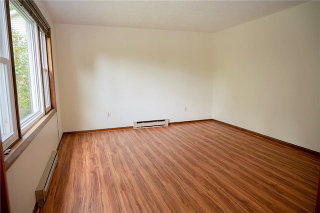 452 Cherokee Dr, Center Twp But, PA 16001 - spare room with a baseboard radiator, wood finished floors, and baseboards
