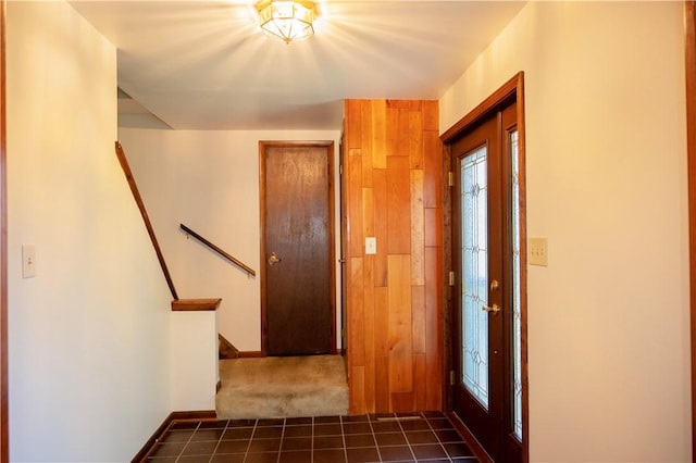 452 Cherokee Dr, Center Twp But, PA 16001 - foyer entrance with dark tile patterned flooring, dark colored carpet, stairway, and baseboards