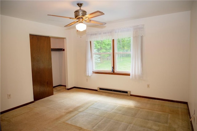 452 Cherokee Dr, Center Twp But, PA 16001 - unfurnished bedroom featuring baseboard heating, light colored carpet, a closet, and baseboards