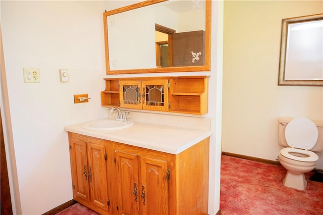 452 Cherokee Dr, Center Twp But, PA 16001 - bathroom featuring toilet, vanity, and baseboards