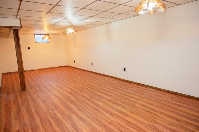 452 Cherokee Dr, Center Twp But, PA 16001 - basement with light wood finished floors, baseboards, and a drop ceiling
