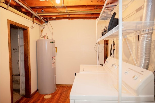 452 Cherokee Dr, Center Twp But, PA 16001 - washroom with electric water heater, independent washer and dryer, wood finished floors, and baseboards