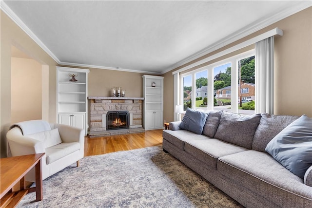 404 Neola Cir, Ross Twp, PA 15237 - living room with wood finished floors, crown molding, and a fireplace