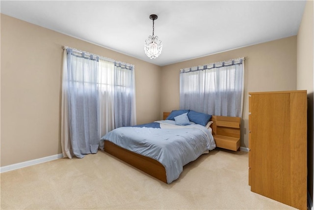 404 Neola Cir, Ross Twp, PA 15237 - bedroom with multiple windows, light colored carpet, and baseboards