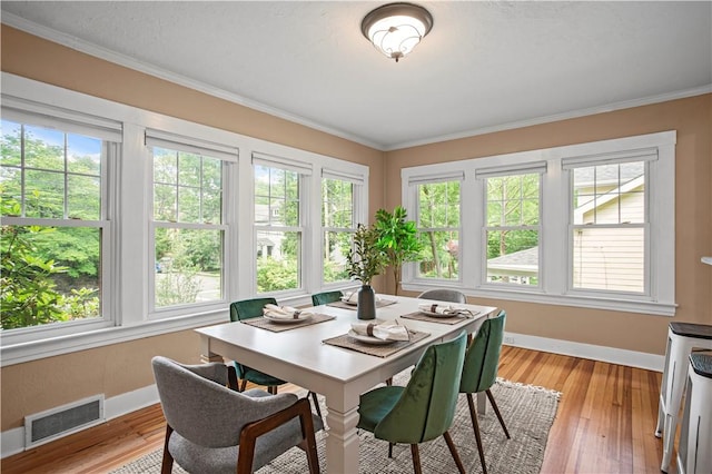 203 W Hutchinson Ave, Regent Square, PA 15218 - dining room featuring ornamental molding and light wood-style floors