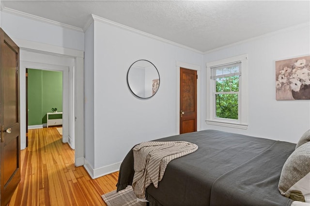 203 W Hutchinson Ave, Regent Square, PA 15218 - bedroom featuring ornamental molding and light wood-type flooring