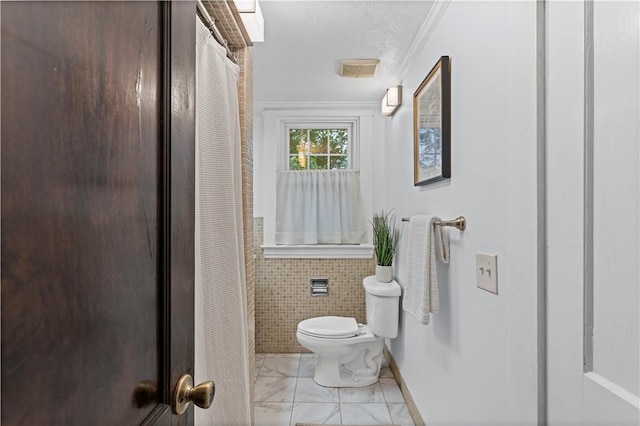 203 W Hutchinson Ave, Regent Square, PA 15218 - full bathroom featuring a shower with curtain, tile walls, marble look tiles, and crown molding