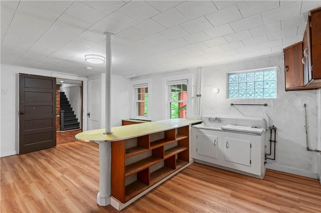 203 W Hutchinson Ave, Regent Square, PA 15218 - kitchen featuring open shelves, light wood-type flooring, plenty of natural light, and light countertops