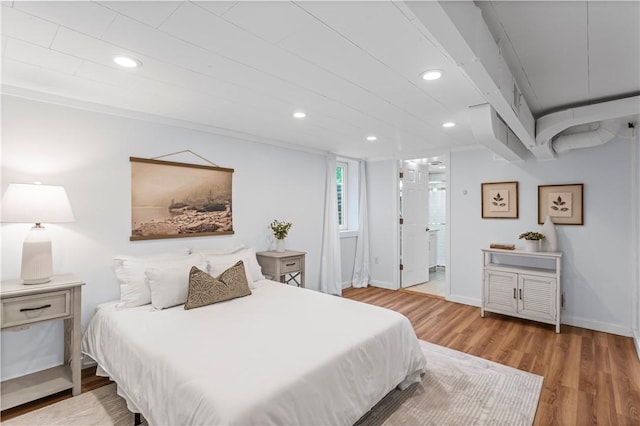 203 W Hutchinson Ave, Regent Square, PA 15218 - bedroom featuring recessed lighting, wood finished floors, and ensuite bathroom