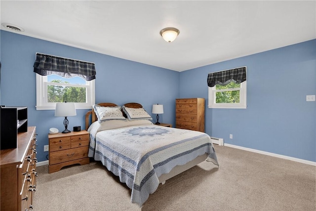 1990 Robbins Station Rd, North Huntingdon, PA 15642 - bedroom featuring multiple windows, a baseboard radiator, and light carpet