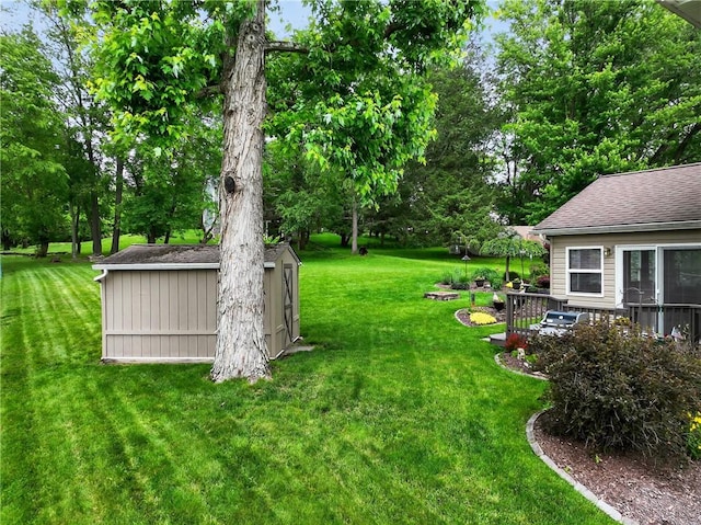 1990 Robbins Station Rd, North Huntingdon, PA 15642 - view of green lawn with a shed and view of wooded area