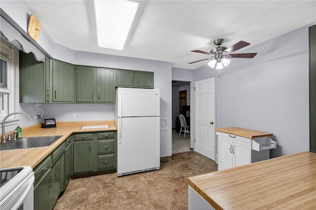 1990 Robbins Station Rd, North Huntingdon, PA 15642 - kitchen featuring white appliances, green cabinetry, ceiling fan, and wooden counters
