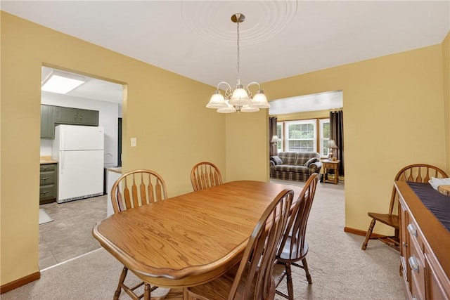 1990 Robbins Station Rd, North Huntingdon, PA 15642 - dining area with a chandelier