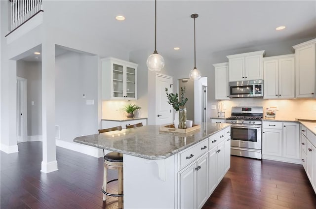 109 Summer Ln, Mount Pleasant Twp Was, PA 15057 - kitchen featuring stainless steel appliances, dark wood-style floors, recessed lighting, light stone countertops, and white cabinetry