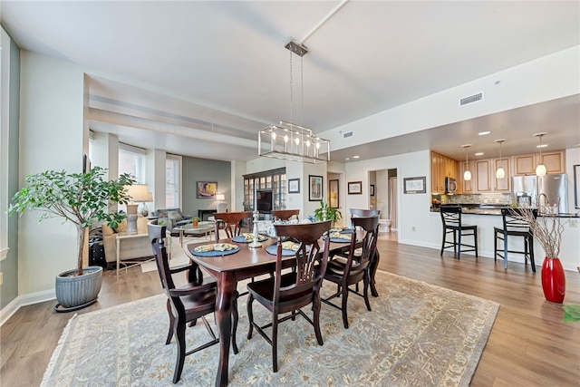 306 4th Ave Unit 902, Downtown Pgh, PA 15222 - dining space featuring light wood-type flooring