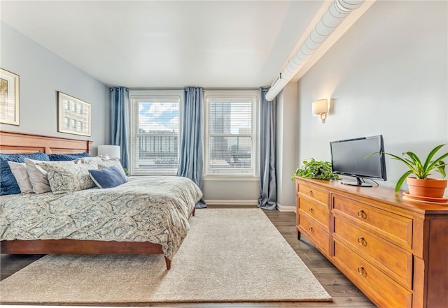 306 4th Ave Unit 902, Downtown Pgh, PA 15222 - bedroom with dark wood finished floors and baseboards