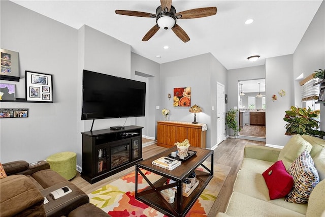 711 SE Simpson Howell, Elizabeth Twp/Boro, PA 15037 - living room with light wood-style flooring, ceiling fan, and recessed lighting