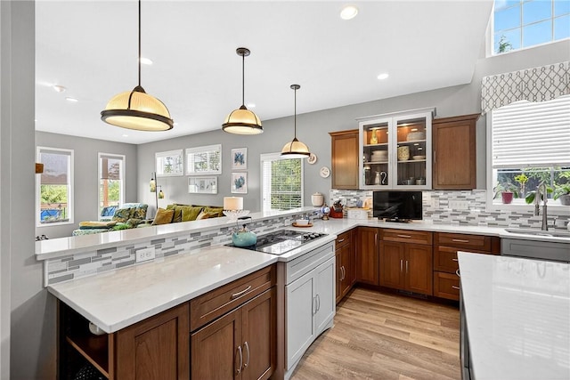 711 SE Simpson Howell, Elizabeth Twp/Boro, PA 15037 - kitchen featuring a peninsula, plenty of natural light, decorative backsplash, pendant lighting, and recessed lighting