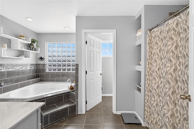 711 SE Simpson Howell, Elizabeth Twp/Boro, PA 15037 - bathroom featuring a bath, healthy amount of natural light, and tile patterned floors