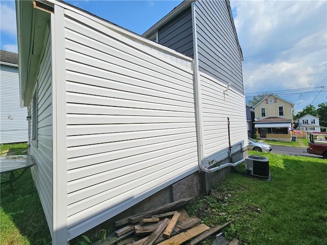 105 Longfellow St, Vandergrift Wml, PA 15690 - view of property exterior with a lawn and a cooling unit