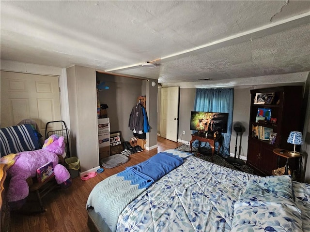 105 Longfellow St, Vandergrift Wml, PA 15690 - bedroom with wood finished floors and a textured ceiling