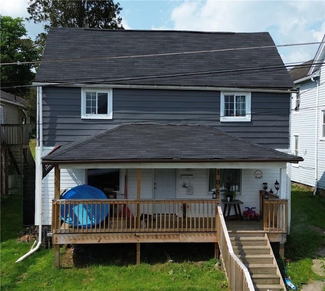 105 Longfellow St, Vandergrift Wml, PA 15690 - back of house featuring a shingled roof and stairway