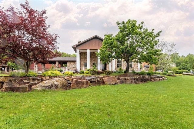33 Chalkhill Ohiopyle Rd, Wharton Twp, PA 15470 - rear view of house with a yard and stone siding