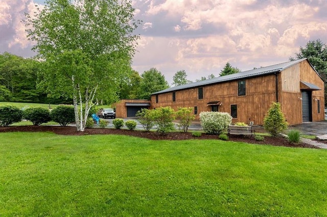 33 Chalkhill Ohiopyle Rd, Wharton Twp, PA 15470 - back of house featuring a lawn, a metal roof, and a garage