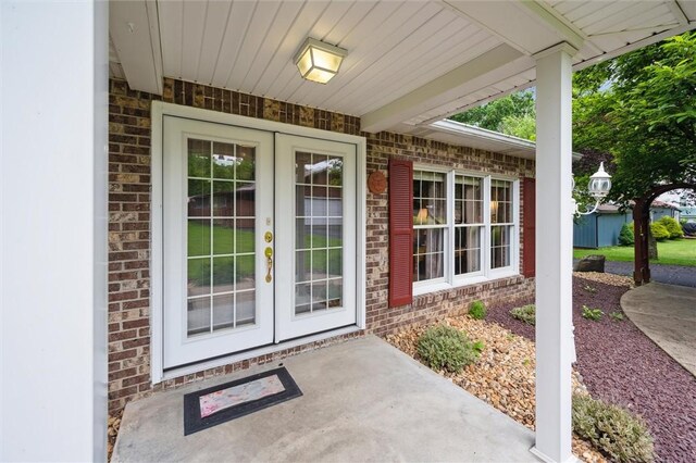 137 Painter Rd, Rayburn Twp, PA 16259 - property entrance featuring french doors and brick siding