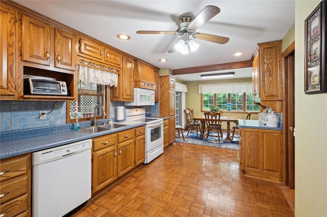 137 Painter Rd, Rayburn Twp, PA 16259 - kitchen with white appliances, brown cabinets, decorative backsplash, recessed lighting, and a ceiling fan