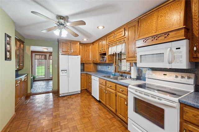 137 Painter Rd, Rayburn Twp, PA 16259 - kitchen featuring white appliances, brown cabinets, backsplash, a ceiling fan, and recessed lighting