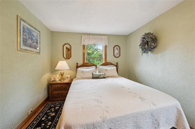 137 Painter Rd, Rayburn Twp, PA 16259 - bedroom with a textured wall and wood finished floors