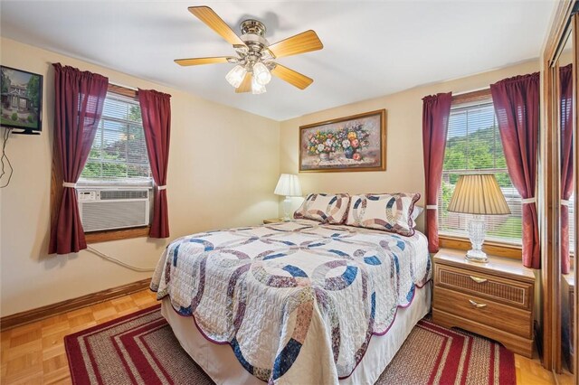137 Painter Rd, Rayburn Twp, PA 16259 - bedroom with multiple windows, cooling unit, and a ceiling fan