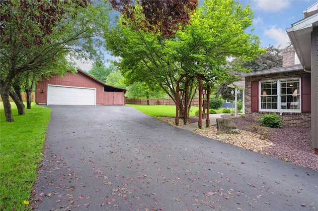 137 Painter Rd, Rayburn Twp, PA 16259 - view of property exterior with a garage, an outdoor structure, and a chimney