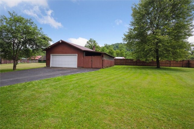 137 Painter Rd, Rayburn Twp, PA 16259 - view of yard with a garage and driveway