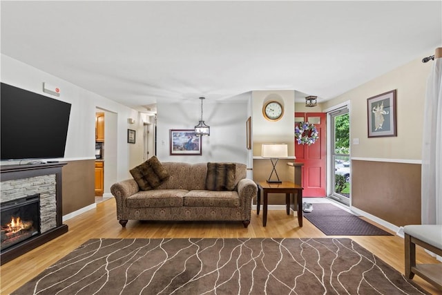 3102 Albine Dr, Shaler, PA 15116 - living area featuring light wood-style floors and a stone fireplace