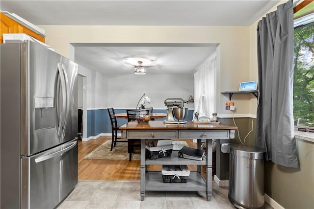 3102 Albine Dr, Shaler, PA 15116 - kitchen with stainless steel fridge with ice dispenser and baseboards