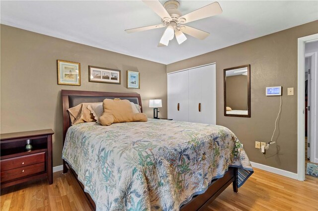 3102 Albine Dr, Shaler, PA 15116 - bedroom featuring a closet, light wood-type flooring, and a ceiling fan