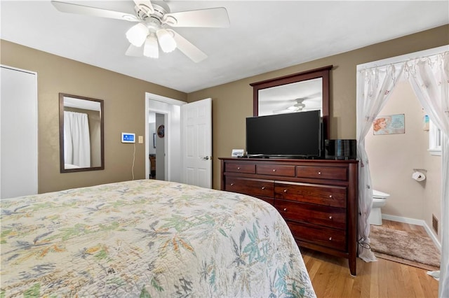 3102 Albine Dr, Shaler, PA 15116 - bedroom featuring light wood finished floors, ensuite bath, and ceiling fan