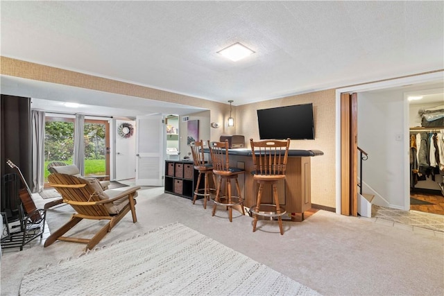 3102 Albine Dr, Shaler, PA 15116 - indoor dry bar featuring carpet flooring, stairs, a textured ceiling, and hanging light fixtures