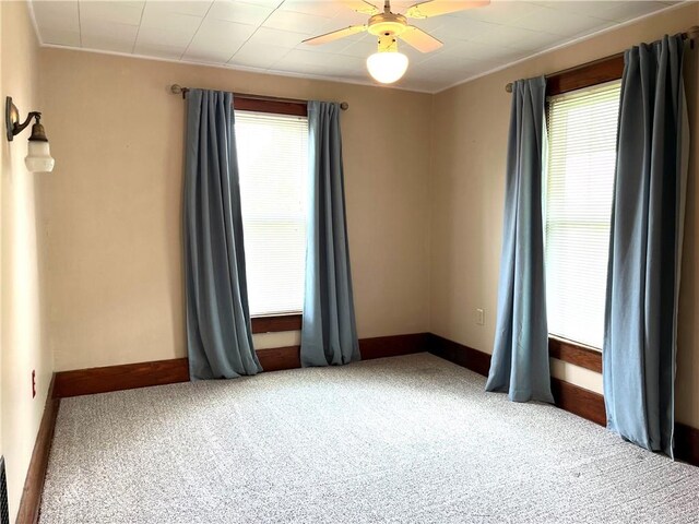 231 Center St, Slippery Rock Boro, PA 16057 - carpeted empty room featuring baseboards and a ceiling fan