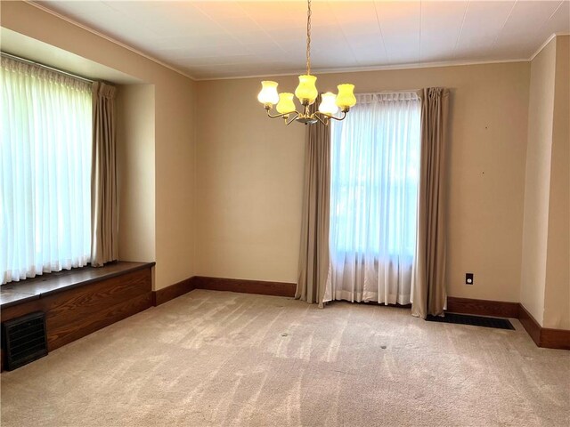 231 Center St, Slippery Rock Boro, PA 16057 - empty room with a chandelier, light carpet, and ornamental molding