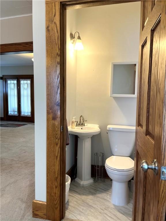 231 Center St, Slippery Rock Boro, PA 16057 - bathroom with toilet and baseboards