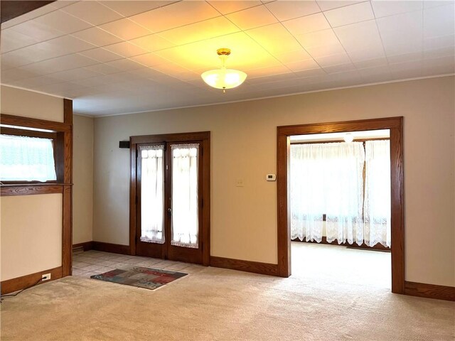 231 Center St, Slippery Rock Boro, PA 16057 - carpeted foyer featuring french doors and ornamental molding