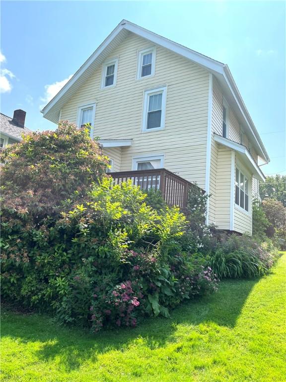 231 Center St, Slippery Rock Boro, PA 16057 - view of property exterior featuring a yard and a wooden deck