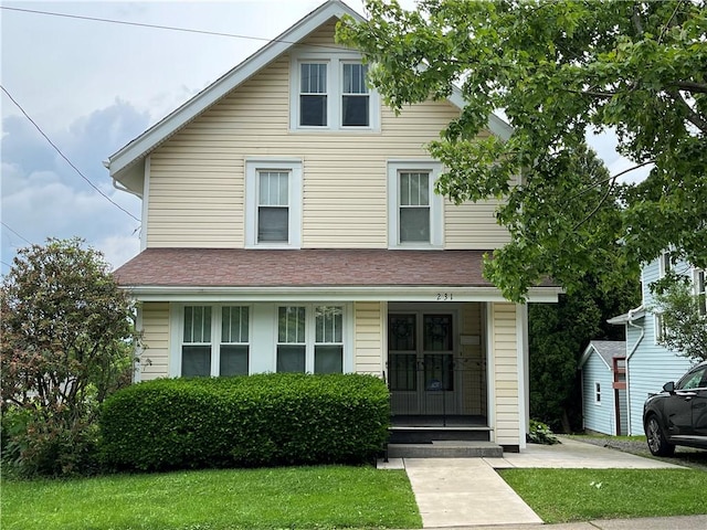 231 Center St, Slippery Rock Boro, PA 16057 - view of front of home featuring covered porch and a front lawn