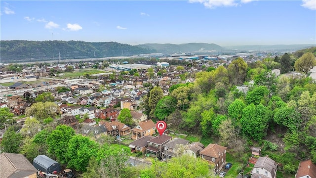 903 11th St, Ambridge, PA 15003 - aerial view of property and surrounding area featuring nearby suburban area and a mountain backdrop