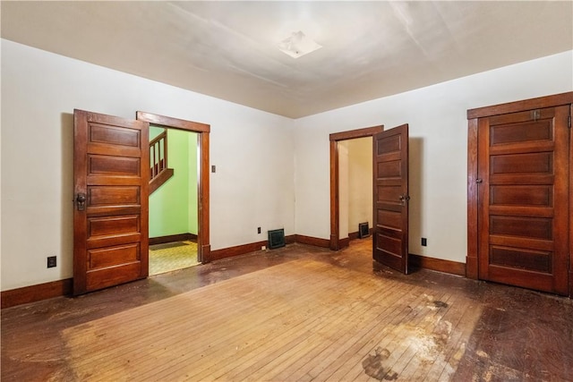 903 11th St, Ambridge, PA 15003 - empty room with baseboards and wood-type flooring