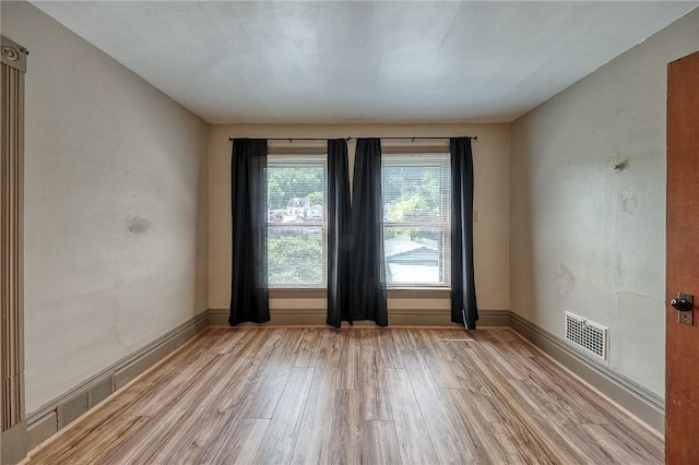 1457 Orator St, Crafton Heights, PA 15204 - spare room with light wood-style flooring and baseboards